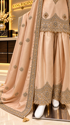 Light peach farshi salwar with embroidered hem border and buti dupatta