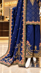 Royal blue farshi salwar with floral embroidered hem and scalloped border dupatta