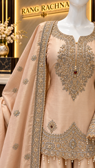 Close-up of zardozi and dabka neckline embroidery on light peach silk kurta